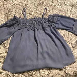 BCX 3/4 sleeve top. Size XS. Light blue. New with tags. Lace detail.